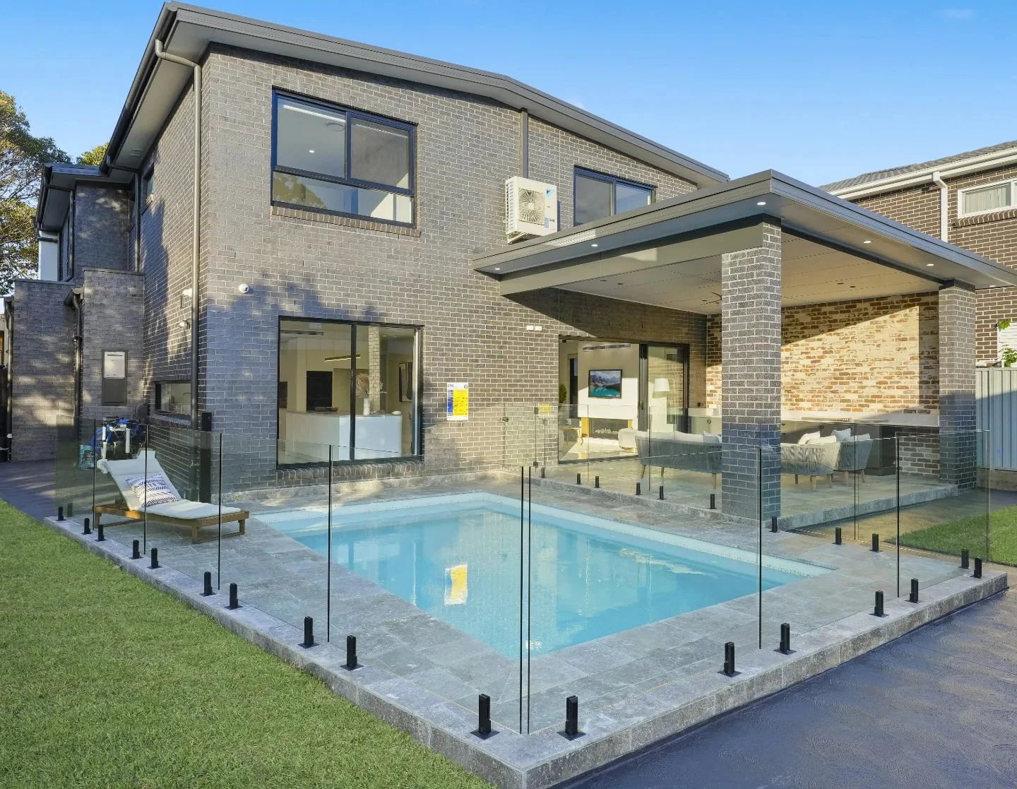 Glass railing around pool