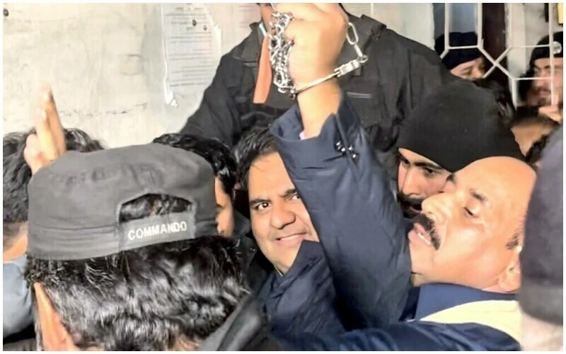 Man surrounded by reporters and cameras