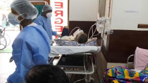 Covid Patient Administering Oxygen in Indian Hospital