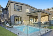 Glass railing around pool
